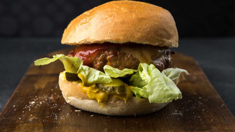 Photo of a beef and cheese burger