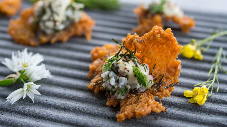 Image of the prawn tartare being plated
