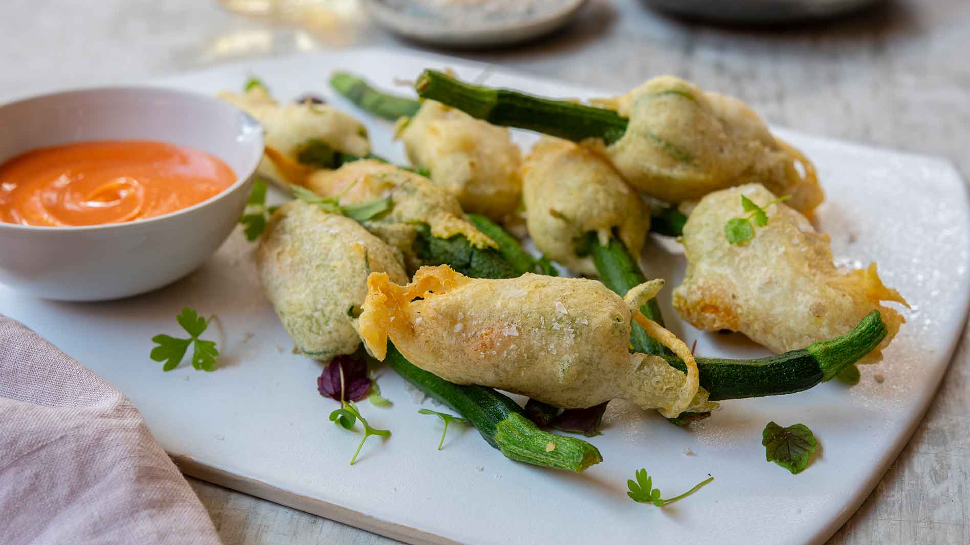Image of Vegan Tempura Zucchini Flowers Stuff With Cashew Cheese