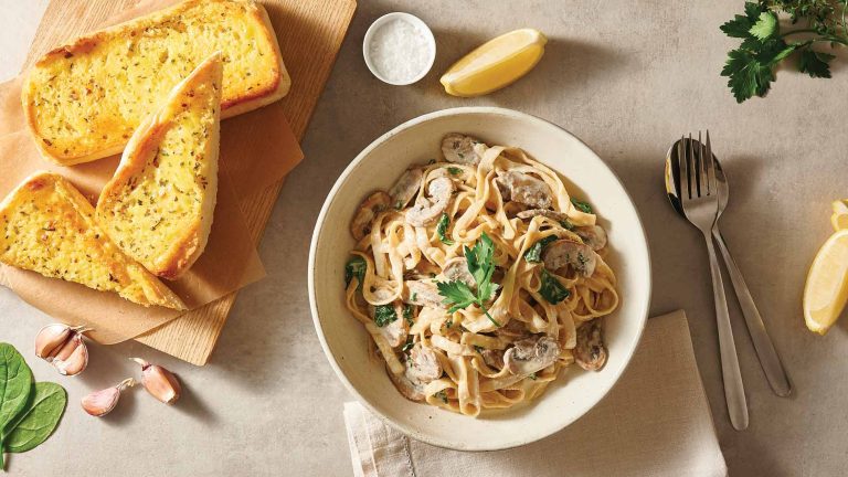 Vegan pasta with garlic bread